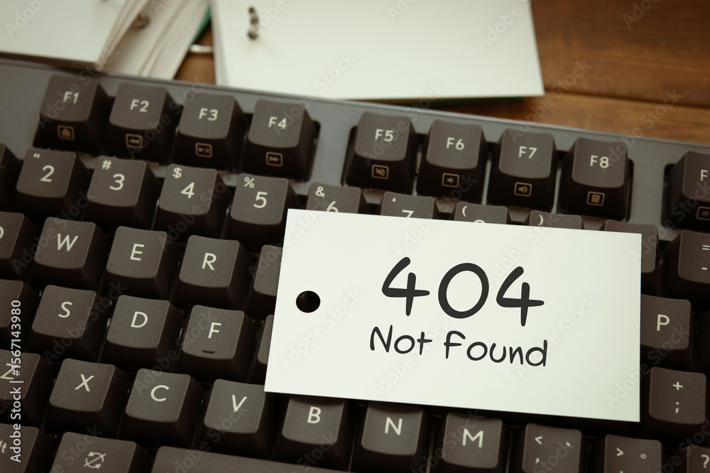 Fototapete there is word card with the word 404 not found. it is as an eye-catching image.