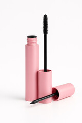 Obraz premium Pink and Black Mascara Tube with Brush
