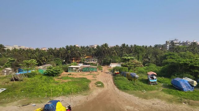 Drone Shot of Palolem Beach Curved Coastline Surrounded by Palm Trees, South Goa, India