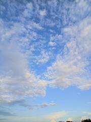 Scattered White Clouds in Blue Sky