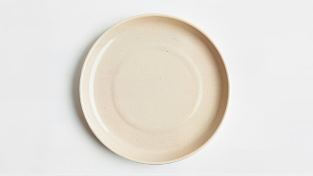 High-angle view of an empty ceramic plate isolated on a white background. Suitable for food presentation, menu design, or product mockups