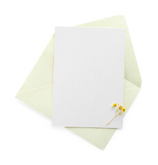 Blank invitation card and envelope isolated on white, top view. Space for design