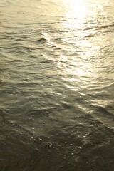 Beautiful sea with sun reflections at sunrise