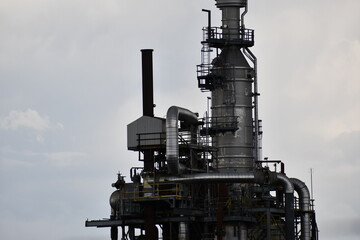 Closeup on oil refinery tower.