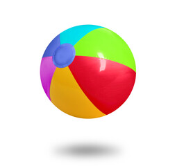 Bright beach ball falling against white background