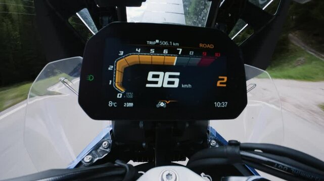 Speedometer revving on scenic ride &ndash; close-up motion