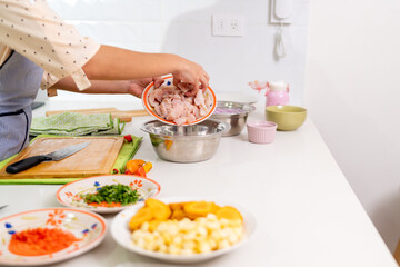 Chef preparing authentic peruvian ceviche with fresh fish and lime