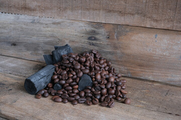 Coffee beans on a wooden background