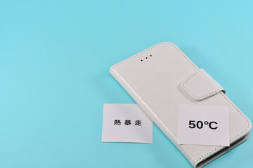 スマホが熱暴走しているイメージ