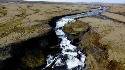 Fototapeta premium Aerial view of the spectacular rapids of Fossaa River, situated in southern Iceland.