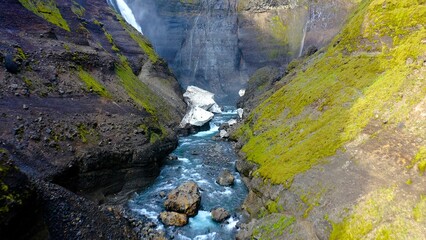 Aerial view of the spectacular Grannifoss waterfall and Fossaa River is a waterfall situated in southern Iceland. The waterfall  drops from a height of 122 meters.