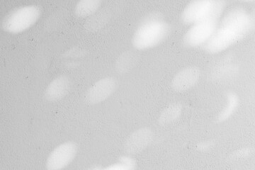close up on white plain wall background texture with shadow of window from sunlight for ads and advertisement product such as cosmetic or content or goods design display concept