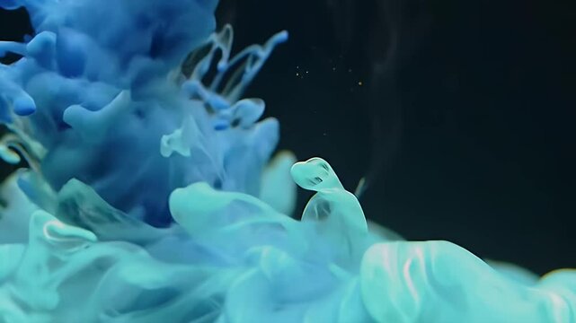 Abstract Light Blue and Aqua Ink Dissolving in Water on Dark Background Creating Organic Shape Adobe Stock Photo