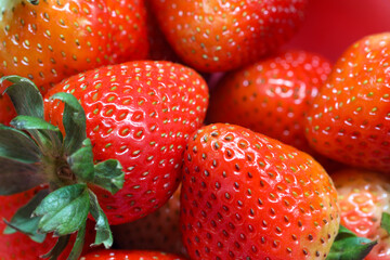 Close-up of ripe strawberries as background.