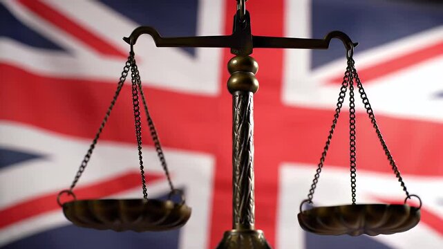 Golden Scales of Justice Against Blurred Union Jack Representing Uk Law