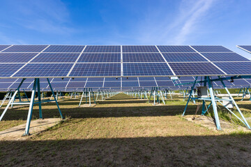 Blue solar panels on sky background. Solar power plant. Solar farm, Alternative source of...