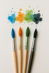 Colorful watercolor splashes with five paintbrushes on textured paper background, perfect for art design projects, creative workshops, painting courses, craft content, illustration and artistic brandi