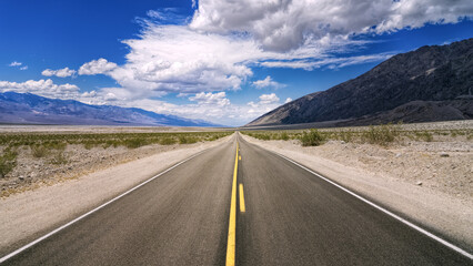 Open Road Under Dramatic Cloudy Sky