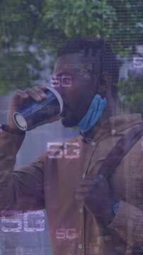 Animation of digital 5g over african american young man with backpack drinking coffee in city