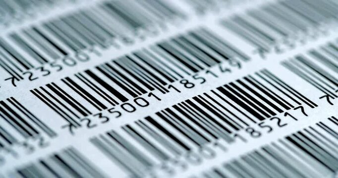 Graphic resource of several barcodes being scanned in the foreground with a blurred effect. In optimal quality.