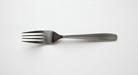 Stainless Steel Dining Fork Isolated on Clean White Background - Kitchen Utensil for Meals and Table Settings