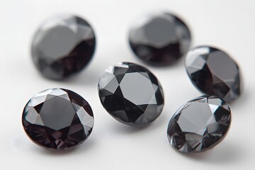 Fototapeta premium A collection of six stunning black diamonds, each facet reflecting light beautifully