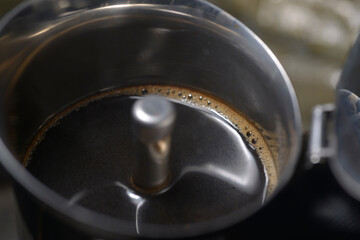 Detailed view of moka pot lid hinge macro