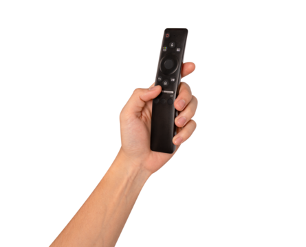 Hand holding remote control isolated on isolated on transparent PNG. - Powered by Adobe