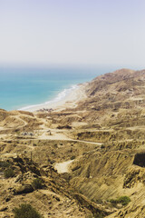 A beautiful beach with a blue ocean in the background