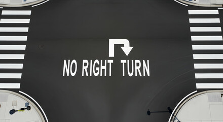 Aerial View Showing No Right Turn Signage Markings On A Dark Asphalt Road