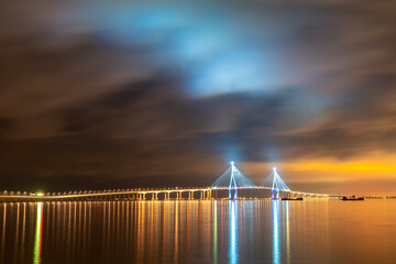 Chon Bridge, night view after sunset with traffic and sea pier at Songdodong, Yeonsugi-gu, beautiful colorful sky, Incheon, South Korea