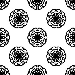 Seamless black and white mandala pattern. Intricate floral and geometric design, ideal for backgrounds, textiles, and decorative elements.