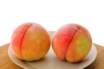 fresh peaches on the dish