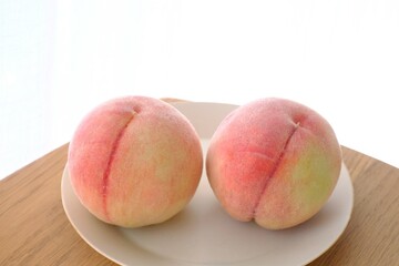 fresh peaches on the dish