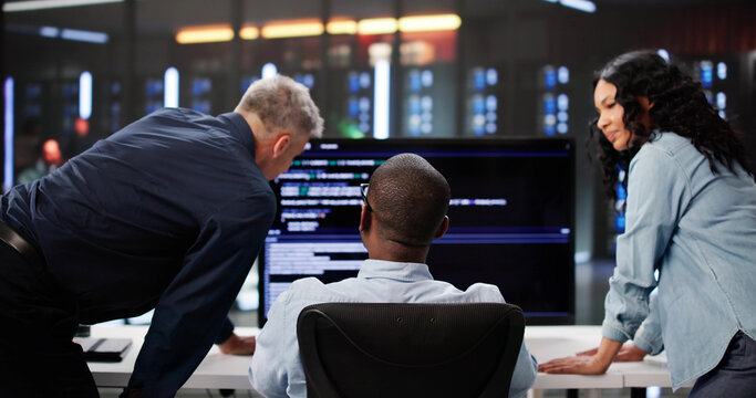 Agile Professionals Collaborate On Programming Efficiency