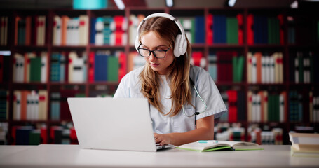 Dedicated Woman Researching Medicine At University Library