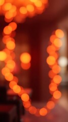 Fototapeta premium Abstract string of blurred orange bokeh lights in a cozy setting