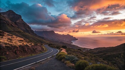 Fototapeta premium Cinematic Mountain Road at Sunset Overlooking Serene Ocean V5