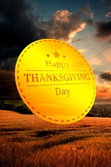 Happy Thanksgiving text against cloudy sky