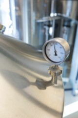 Close-up of gauge at distillery