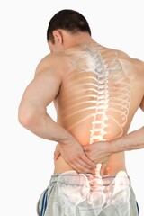 Highlighted spine of man with back pain
