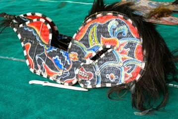 close up of colorful horse puppet as a property in a traditional Javanese dance art called Jathilan