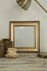 Photo frame and coffee cup on table © vectorfusionart