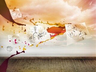 Sheets with graphics over sky on wall