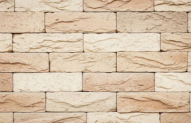 Fototapeta premium Brick stone wall Background for decorate. Surface brown sand marble wall texture background.