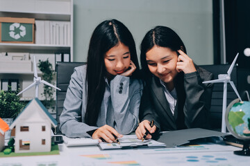 Business team people planning and discussing on recycle reduce reuse policy symbol in office meeting room.