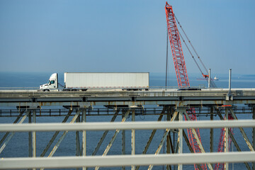 Truck on the road. Lorry transporting. Cargo trailer. Logistics truck, international shipment....