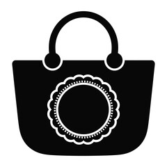 Black silhouette of a tote bag with a decorative scalloped circular emblem