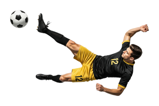 Male football player performing bicycle kick in black and yellow uniform, isolated on transparent background