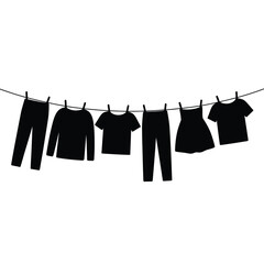 Black silhouette of various clothing items drying on a clothesline